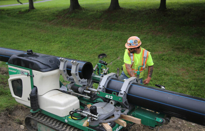 An ISCO team member fusing HDPE pipe