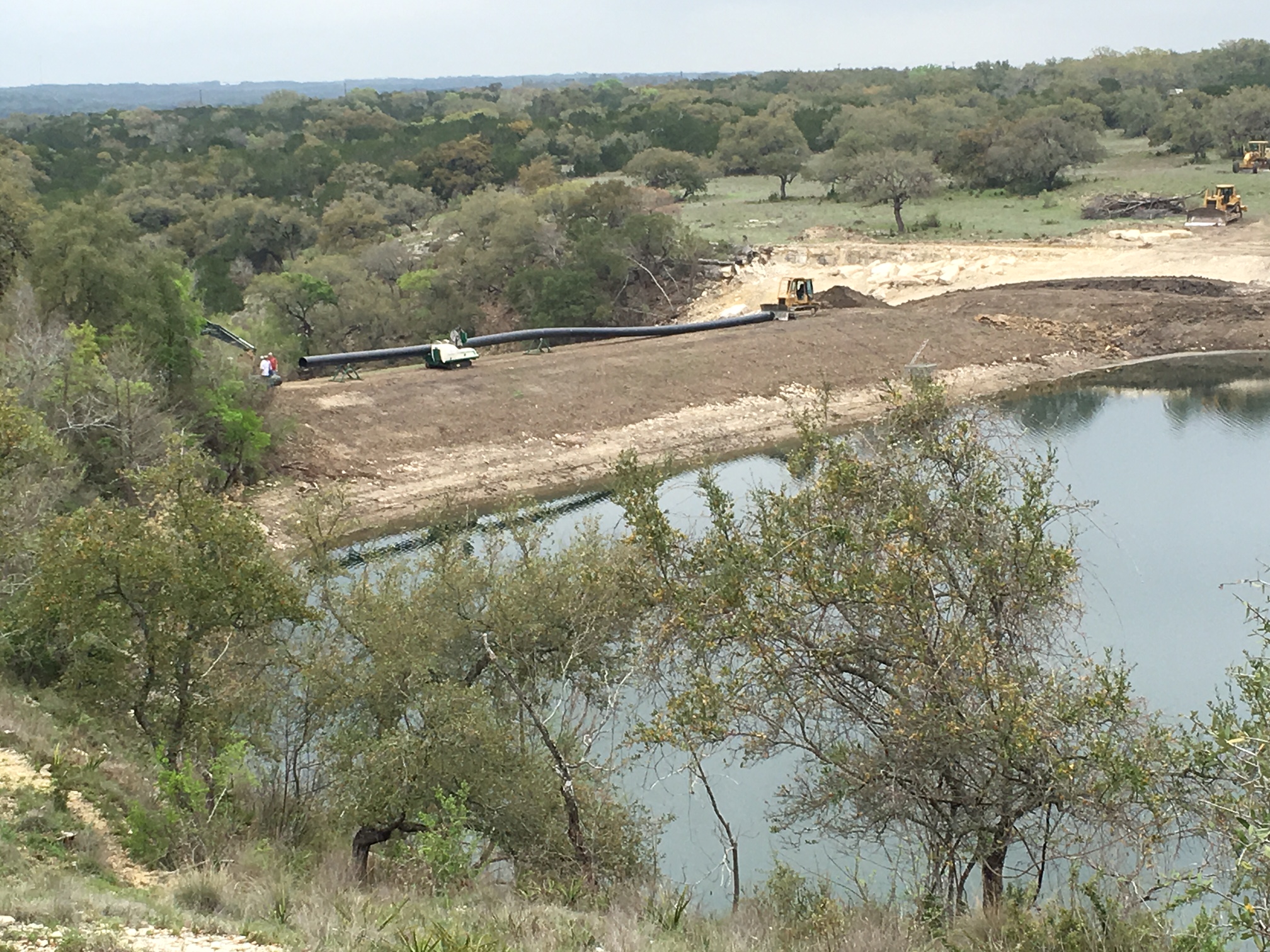 McElroy fusion equipment fusing HDPE pipe fixing a spillway in Wimberly, Texas